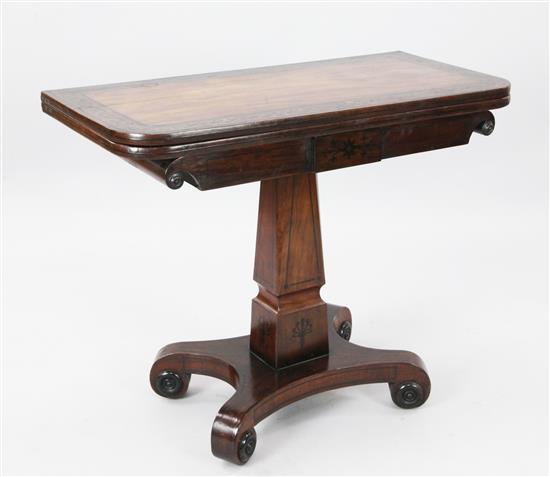 A George IV ebony inlaid mahogany card table, W. 3ft. D. 17.5in. H. 2ft 5.5in.